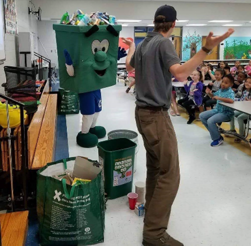 Athens Clarke County conducting a recycling presentation at a local school.png