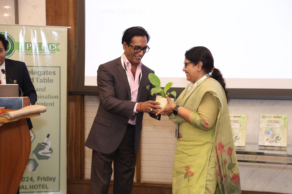 Mr Ashok Chaturvedi Felicitating Dr Smita Mohanty, Principal Director CIPET.JPG